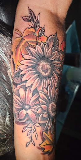 Explore magician tattoo ideas, creative tattoo ideas in Angola, available at Hoodlum Ink