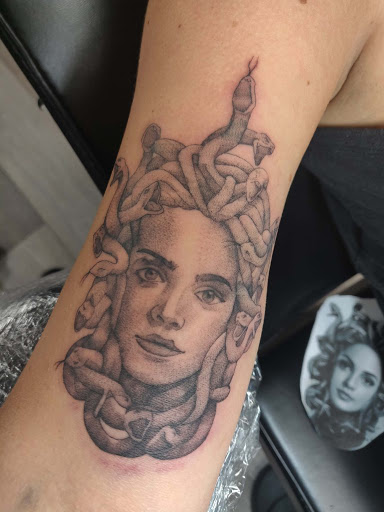 Explore betrayed tattoo ideas, creative tattoo ideas in Nashville, available at Titan Tattoo