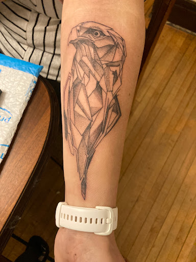 Explore chandelier tattoo ideas, creative tattoo ideas in Watertown, available at Muse Tattoo