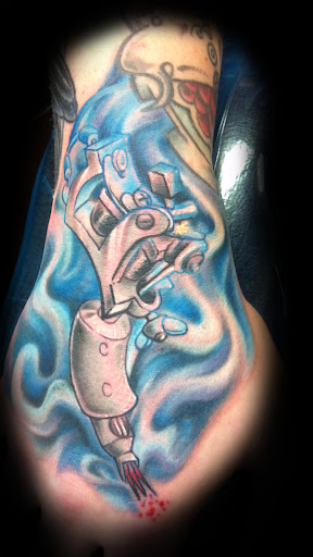 Explore inner bicep tattoo ideas, creative tattoo ideas in Saint Cloud, available at Wingnut Tattoo & Piercing Studio