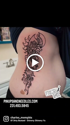 Explore cool arm tattoo ideas for guys, creative tattoo ideas in Traverse City, available at Pinups & Needles