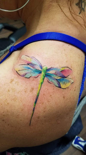 Explore wine tattoo ideas, creative tattoo ideas in Wake Forest, available at Revelation Ink Tattoo and Piercing