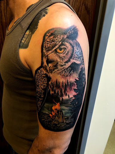Explore beagle tattoo ideas, creative tattoo ideas in Lakeville, available at SharkTooth Tattoo & Gallery