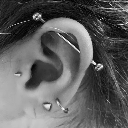 Explore rose vine tattoo ideas, creative tattoo ideas in Memphis, available at Studio 42