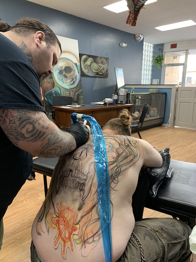 Explore lion and lamb tattoo ideas, creative tattoo ideas in Bangor, available at Blind Faith Tattoo Studio