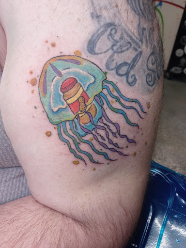 Explore tattoo ideas for dogs, creative tattoo ideas in Park Hills, available at Sideshow Tattoo and Piercings