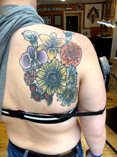 Explore birth date tattoo ideas for guys, creative tattoo ideas in Minneapolis, available at Nokomis Tattoo