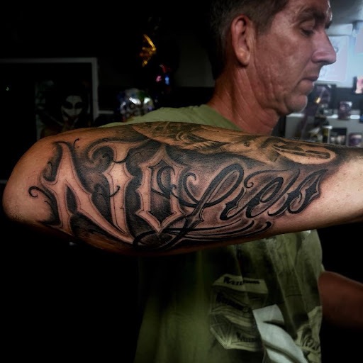 Explore hood neck tattoos ideas, creative tattoo ideas in Uvalde, available at Artistik Kreationz 96
