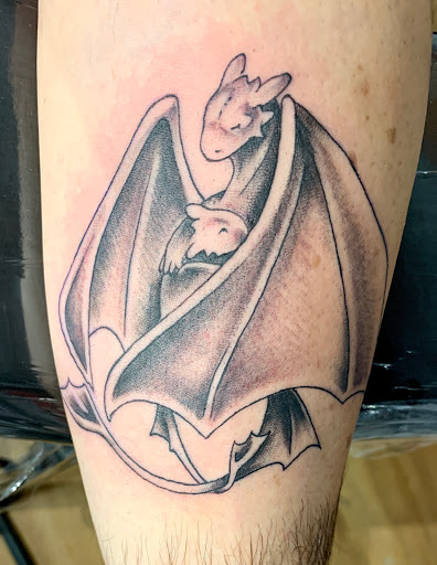 Explore dog paw tattoos ideas, creative tattoo ideas in Portland, available at Tattoo 34