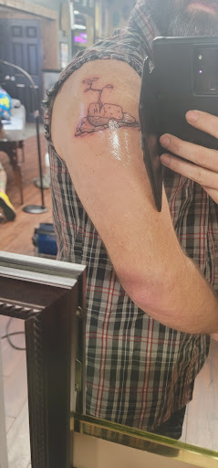 Explore neck tattoo ideas for women, creative tattoo ideas in Saraland, available at Exit 13 Tattoo