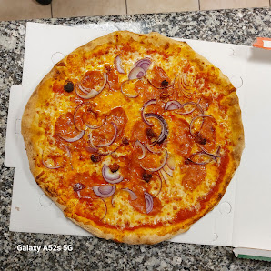 Pizzeria D’Asporto e Kebab Giovannino Via della Pace, 13, 22074 Lomazzo CO, Italia