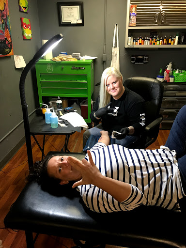 Find tattoo ideas with roses for your next unique tattoo in Newton at Awol Ink