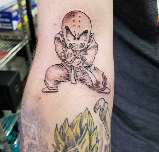 Explore apple tattoo ideas, creative tattoo ideas in Pocatello, available at Tys Tattoos