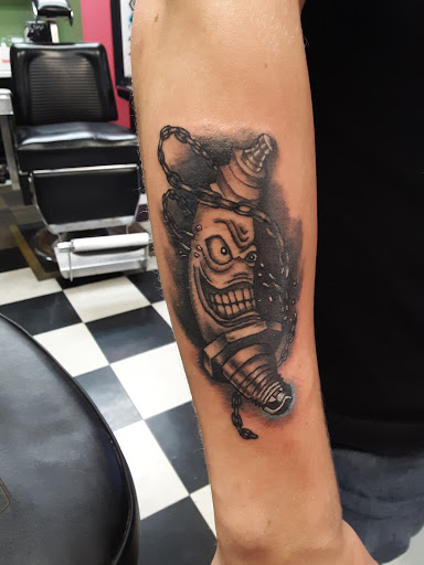 Tattoo Shop «Art In Motion Inc Tattooing», reviews and photos, 415 S Broadway St, Medina, OH 44256, USA