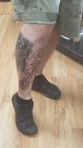 Explore saint tattoo ideas, creative tattoo ideas in Harrisburg, available at Rayzor Tattoos