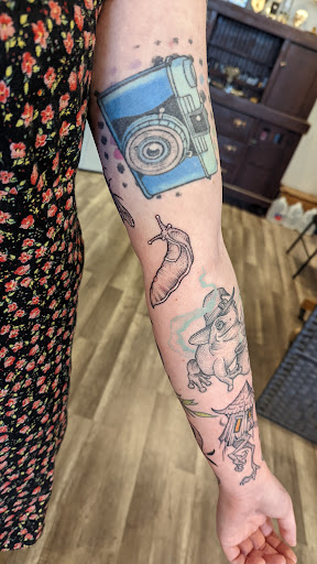 Explore newborn tattoo ideas for mom, creative tattoo ideas in Portland, available at Dire Wolf Tattoo Studio