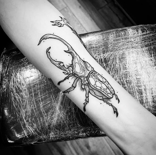 Explore tattoo ideas for family symbol, creative tattoo ideas in Mastic, available at East End Tattoo of MasticShirley