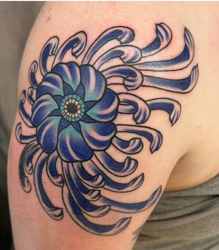 Explore hand small tattoo ideas, creative tattoo ideas in Marietta, available at The Queen Bee Tattoo and Piercing Parlour