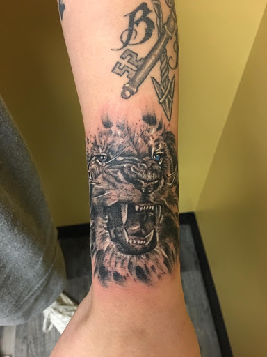 Explore tattoo ideas bicep, creative tattoo ideas in Warner Robins, available at Untold Pain Tattoo Studio