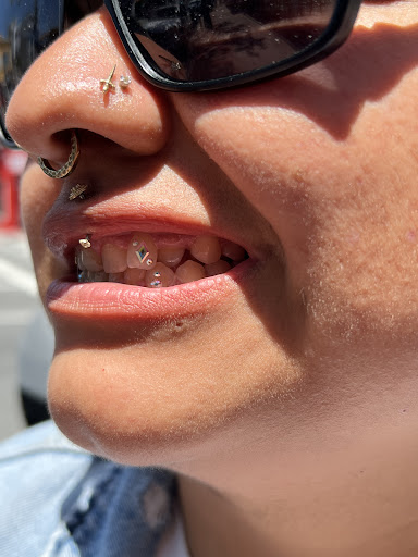 Explore rip cross tattoo ideas, creative tattoo ideas in San Diego, available at Luna Studio Body Piercings & Tooth gems