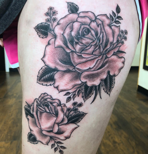 Explore foot print tattoo ideas, creative tattoo ideas in Frisco, available at Frisco Tattoo Company - Steel PaintBrush