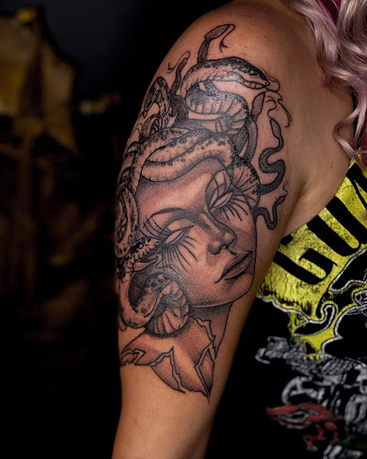 Explore thigh cover up tattoo ideas, creative tattoo ideas in Elkview, available at Andy Electric Tattoos