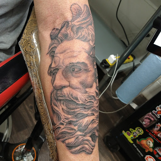 Explore cover up tattoo ideas on thigh, creative tattoo ideas in Abilene, available at A Tattoo Experience by Spaz