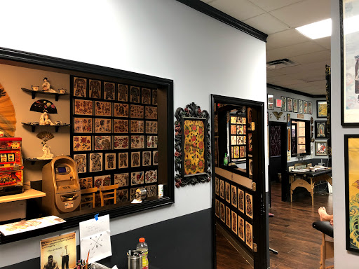 Explore feminine back tattoo ideas, creative tattoo ideas in Jacksonville, available at Idle Hands Tattoo Co.