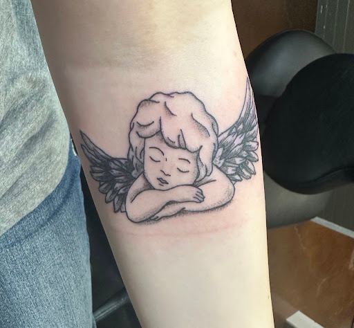 Explore uplifting tattoo ideas, creative tattoo ideas in Weatherford, available at Old Souls Ink