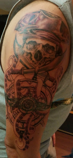 Explore simple owl tattoo ideas, creative tattoo ideas in Pinellas Park, available at Lollis Studios Tattoo Company