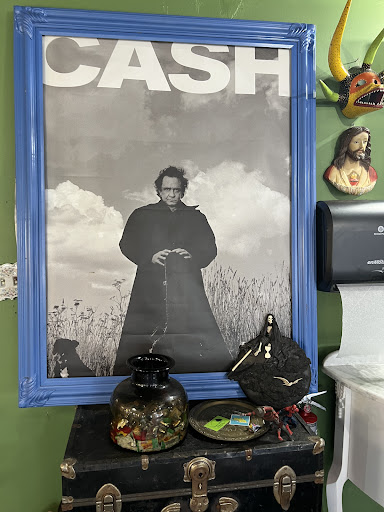 Explore tattoo cover up ideas for upper back, creative tattoo ideas in Savannah, available at Tramp Art Studios