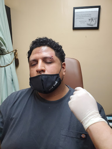 Explore small neck tattoo ideas, creative tattoo ideas in Oceanside, available at Body Piercing By Tracy