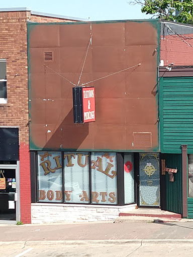 Find tattoo under breast ideas for your next unique tattoo in Cedar Falls at Ritual Body Arts