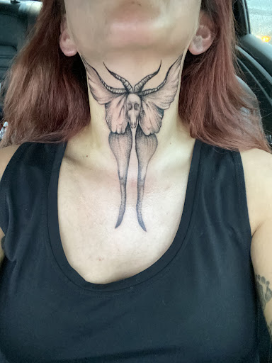 Explore haunted mansion tattoo ideas, creative tattoo ideas in Clarksville, available at Dark Raine Tattoo