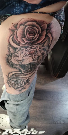 Explore traditional hand tattoo ideas, creative tattoo ideas in Shippensburg, available at Guerilla Tattoo