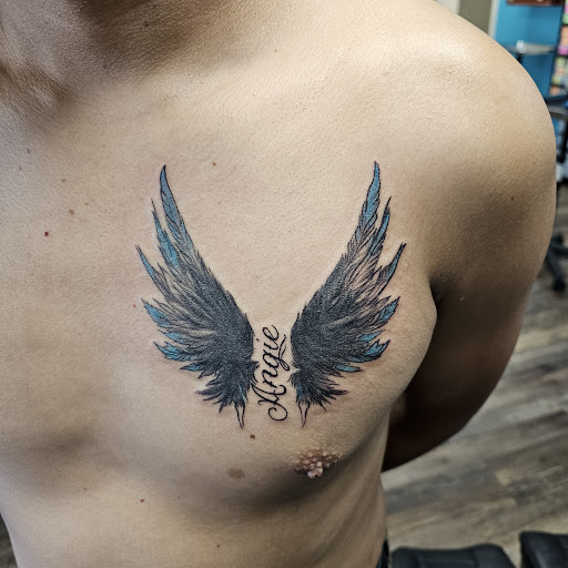 Explore dark themed tattoo ideas, creative tattoo ideas in Traverse City, available at Pinups & Needles