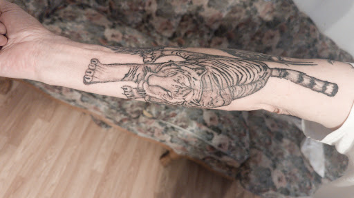 Explore jake the dog tattoo ideas, creative tattoo ideas in Canyon Lake, available at Timeless Tattoos L.L.C.