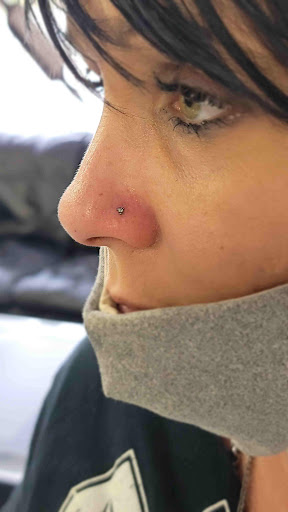 Explore leg flower tattoo ideas, creative tattoo ideas in Sarasota, available at Z-Edge Tattoo and Body Piercing North Shop