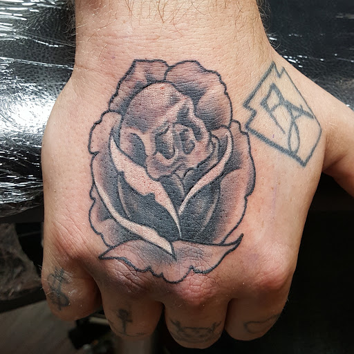 Explore mens tattoo filler ideas, creative tattoo ideas in Scranton, available at Slingin Ink tattoo & piercing