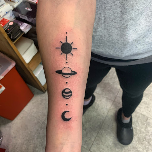 Explore tattoo photography ideas, creative tattoo ideas in Hudson Falls, available at ALTERED ADDICTION TATTOOS