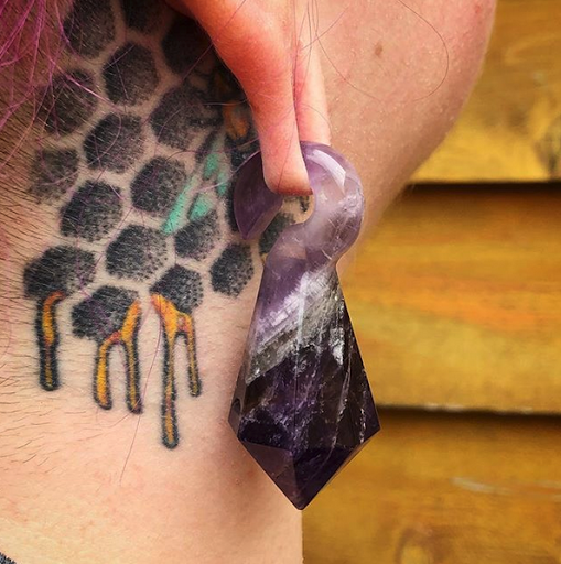 Explore smoke tattoo ideas, creative tattoo ideas in Oshkosh, available at Piercings by Molly Moon at 920 Tattoo and Piercing