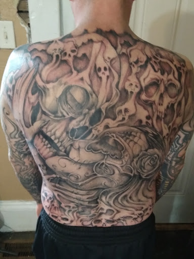 Explore football tattoo ideas, creative tattoo ideas in Roanoke, available at RailYard INK