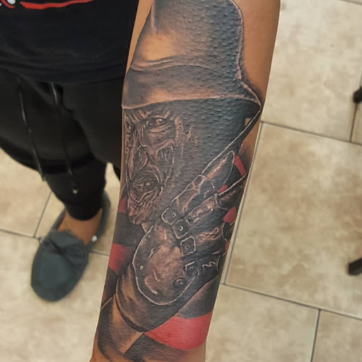 Explore tattoo son ideas, creative tattoo ideas in Pittsburg, available at Delta Art & Tattoo