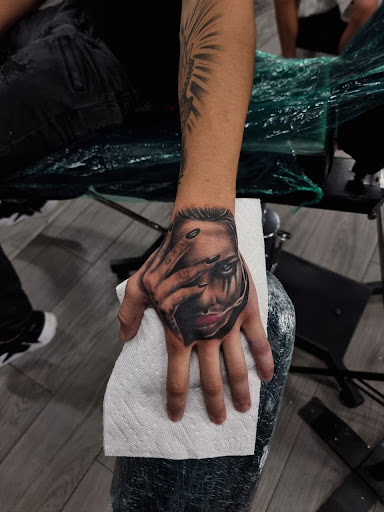 Explore olive branch tattoo ideas, creative tattoo ideas in Miami, available at Inkaholik Tattoos Kendall