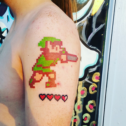 Explore pride and prejudice tattoo ideas, creative tattoo ideas in Kansas City, available at Rose Tattoo Parlor