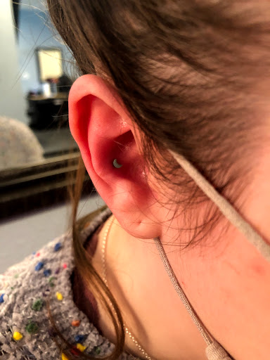 Find surrealism tattoo ideas for your next unique tattoo in Palm Harbor at Angry Owl Tattoo and Piercing