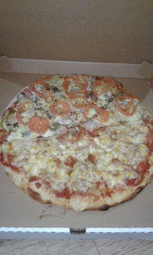 Opiniones de Pizzeria con horno de leña la fogata dorada en Manta - Pizzeria