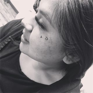 Explore dainty spine tattoo ideas, creative tattoo ideas in Anaheim, available at Crabby Travi Body Piercing