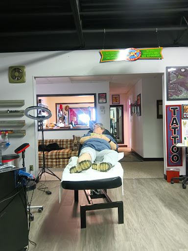 Explore mens sleeve tattoo filler ideas, creative tattoo ideas in Peoria, available at Guerrilla Ink Tattoos