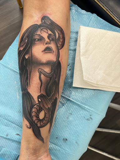 Explore cover up tattoo ideas on hand, creative tattoo ideas in Roselle, available at Garden Ave Tattoo